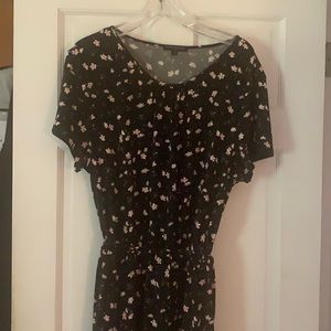 Black with small flowers. Elastic wait cloth belt.